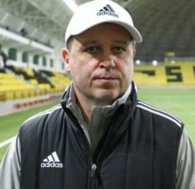 Lesia Vernydub husband Yuriy Vernydub on the stadium.
